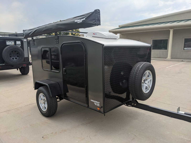  and fishing rods. An adventure-ready setup.|Scenic rv rental camping: Teardrop trailer