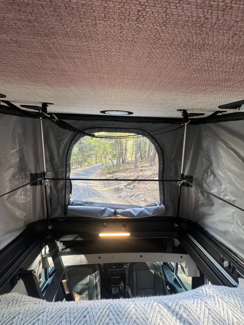  & overhead cabinets. Ready for travel!|An RV rental's inviting rear interior — photo 15