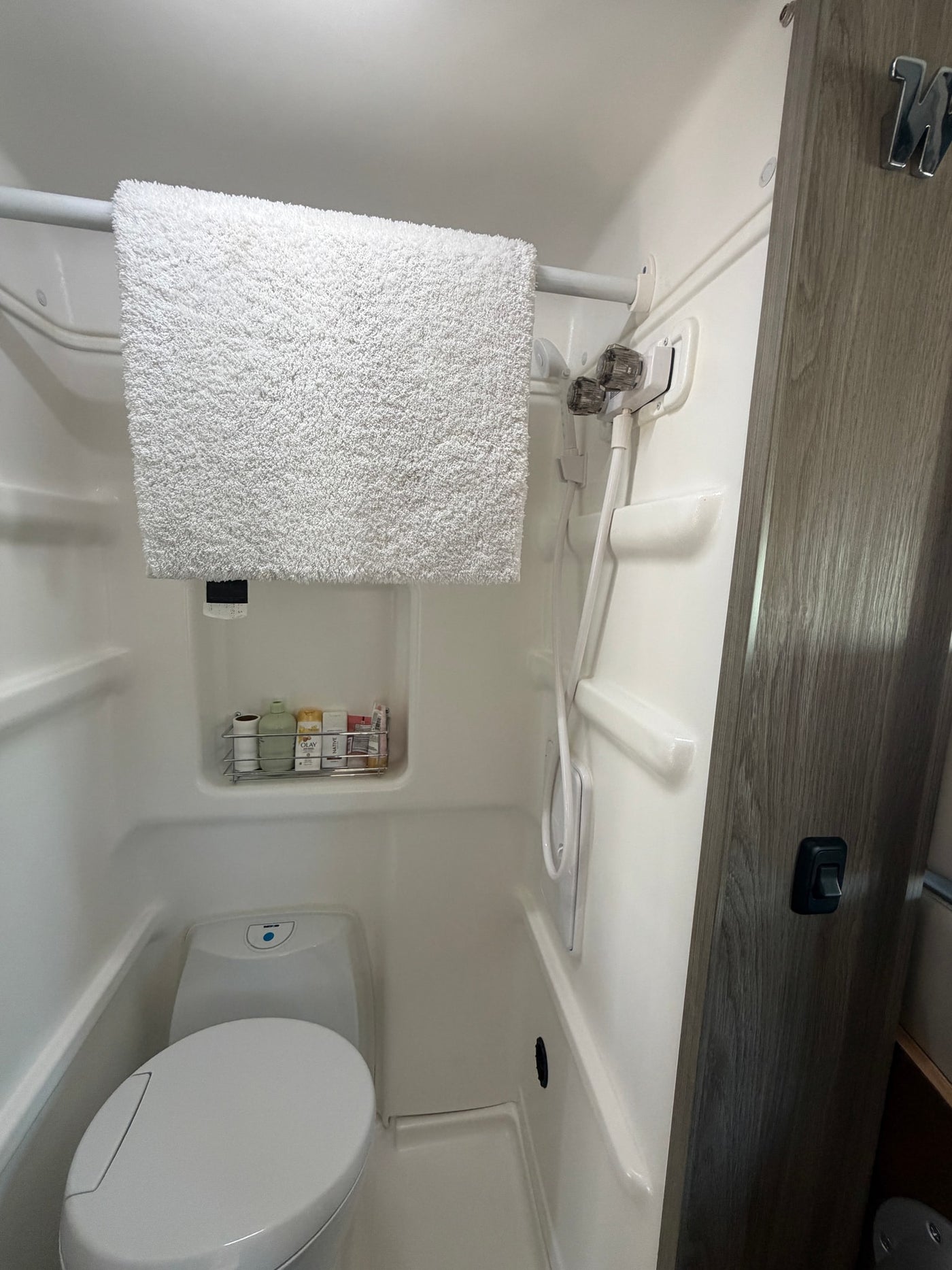  empty mini-fridge in an **rv rental**. Ready for your trip — photo 17