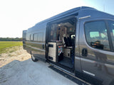 Get ready for your next road trip! Winnebago camper van RV rental with open door displaying its well-equipped interior.