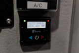 This RV rental's climate control features an Espar heater panel, showing "HEATER ENABLED" at 65F with indicator lights.