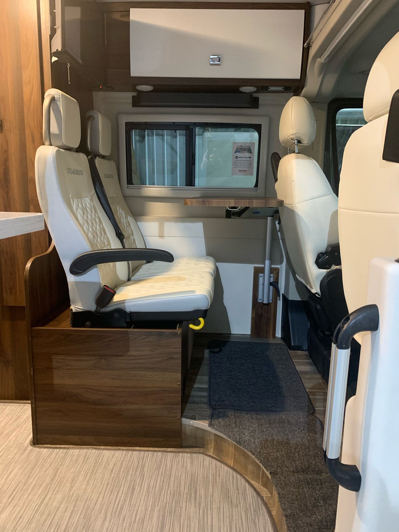  plus a wet bath with toilet and wooden mat.|RV rental interior: cozy bed — photo 8