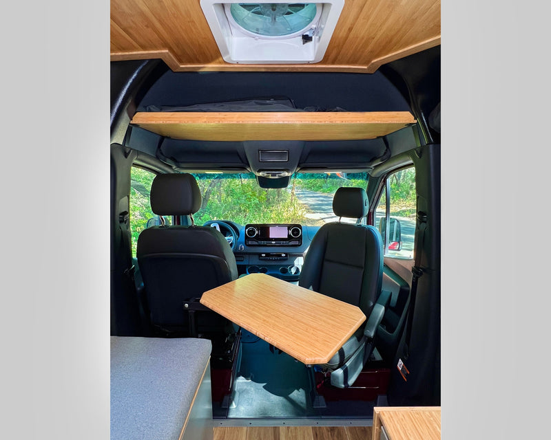  and inviting bed for road trips.|Experience this rv rental: a compact interior featuring a modern kitchen with sink & stove — photo 10