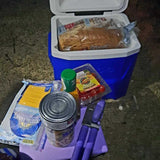 RV rental ready: cooler, bread, cheese, grape tomatoes, canned food, and can opener for your outdoor meals.