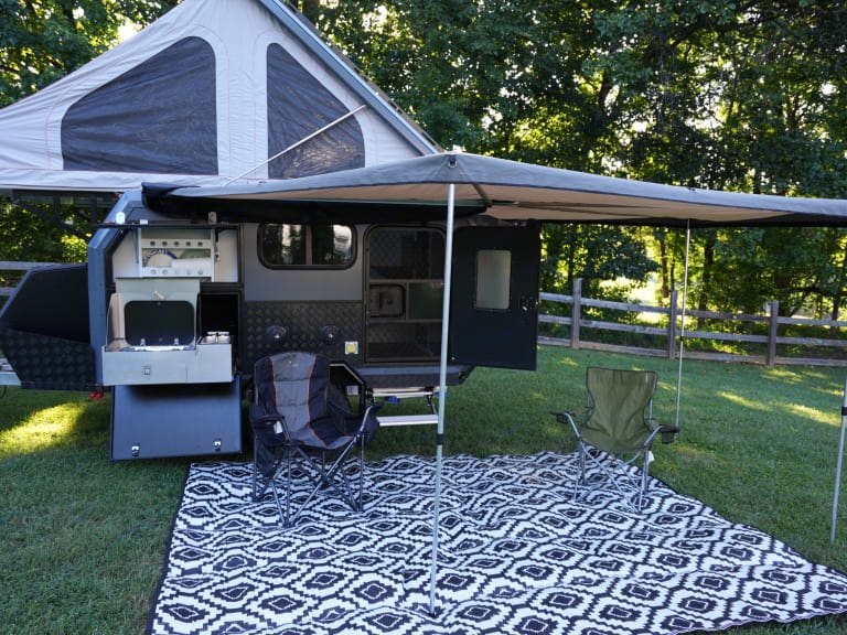 Enjoy this RV rental! A versatile camping trailer with an outdoor kitchen — photo 1