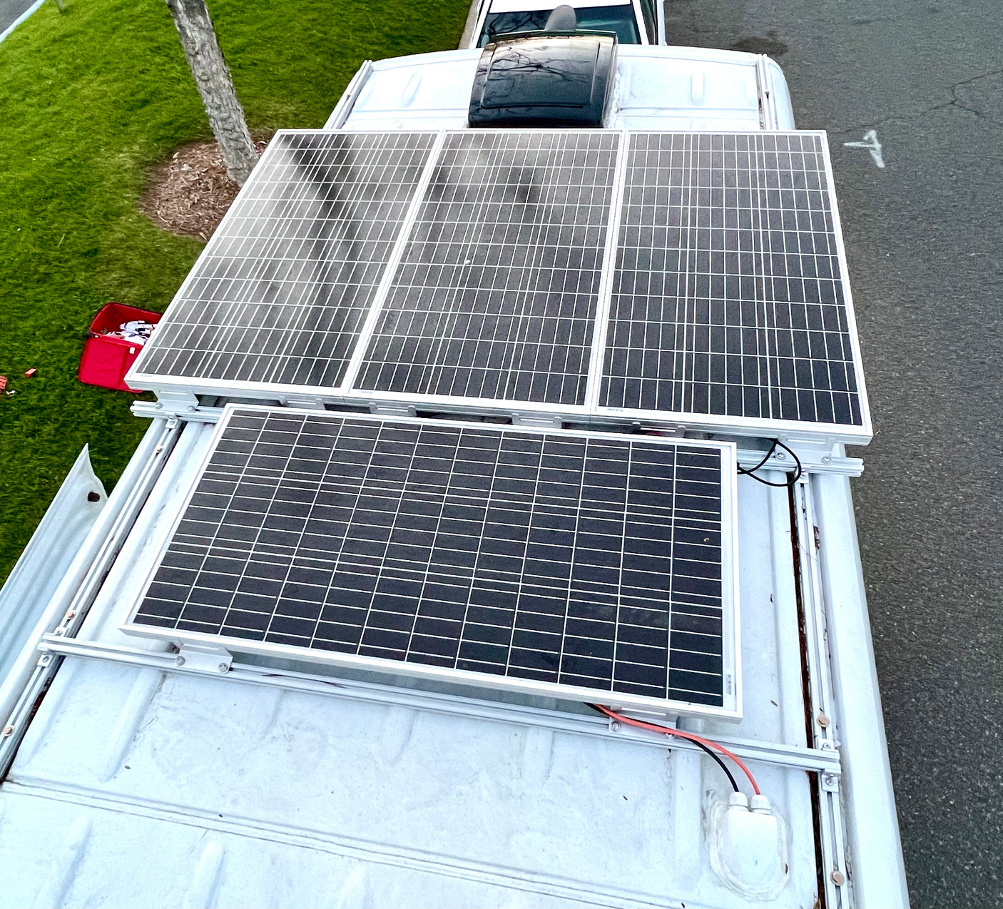 Four solar panels power this rv rental, enabling off-grid travel from its roof.