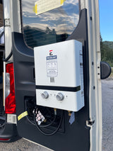 This RV rental van features a mounted Eccotemp portable water heater on the rear door, perfect for outdoor showers.