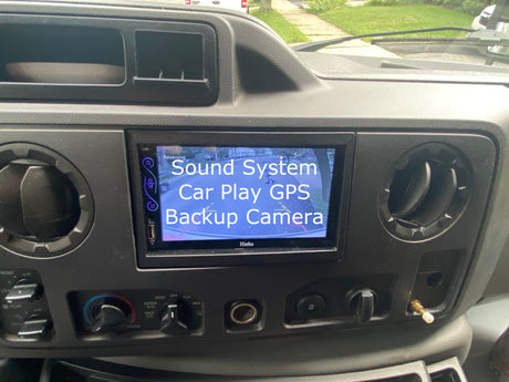 RV rental dashboard: Hieha infotainment system displaying active backup camera, GPS, and climate controls.
