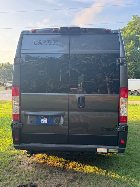 Rear view of a gray Dazzle Thor camper van, an excellent RV rental option with Camping World branding.