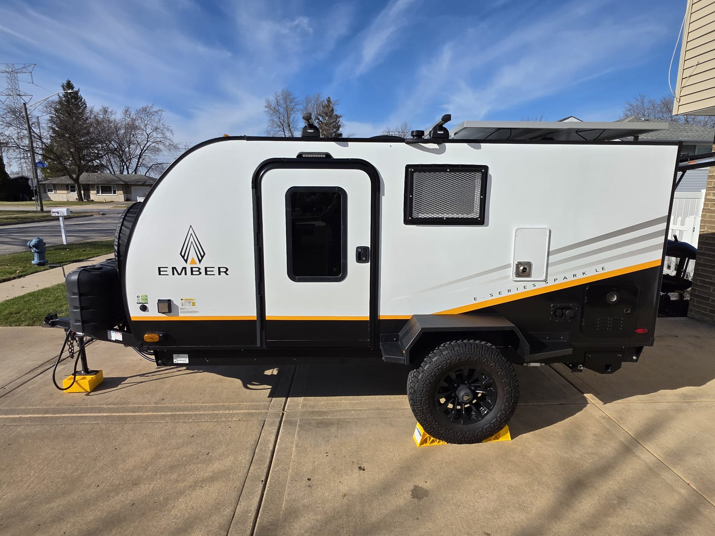 Ember E-Series Sparkle travel trailer, perfect for an rv rental, features solar panels, off-road tires, and rugged design. — photo 7