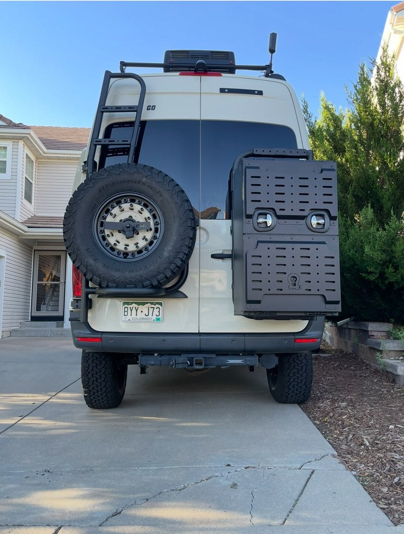  grassy landscape.|Front of a rugged grey Mercedes Sprinter rv rental van — photo 2