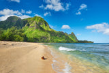 Breathtaking tropical beach with lush green mountains & clear ocean waves. Perfect for an unforgettable RV rental adventure.