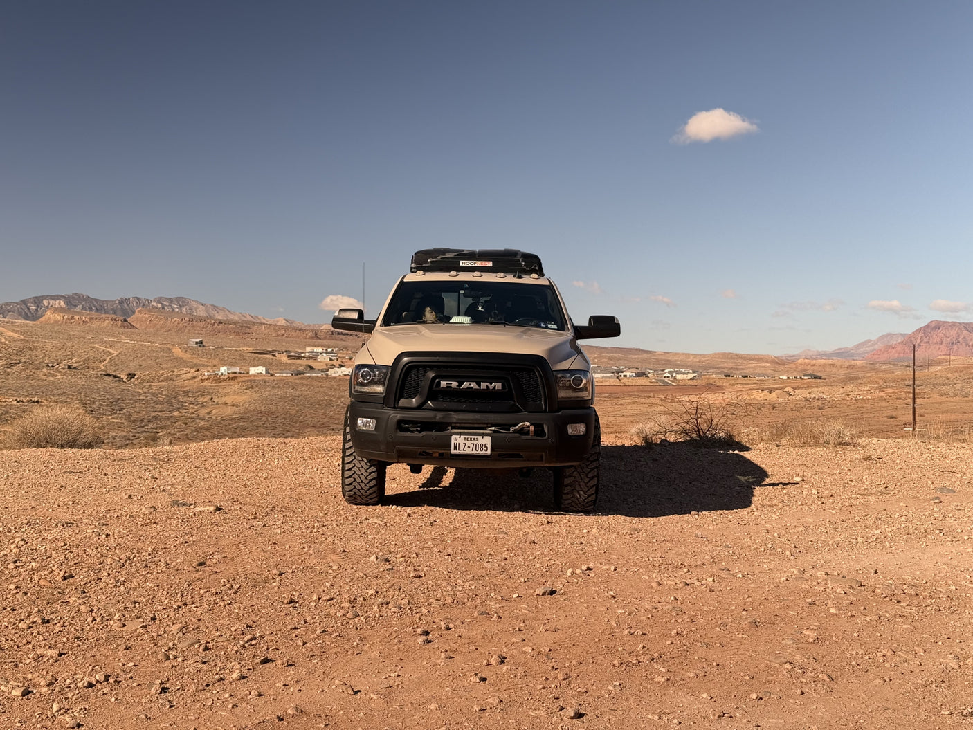 Adventure awaits! This off-road truck with a rooftop tent is your ideal RV rental for exploring desert landscapes.