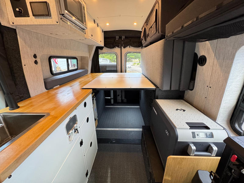  plus a soundbar. Perfect for glamping.|Inside a comfy RV rental: Enjoy breakfast with fresh strawberries — photo 7