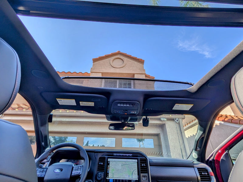  ideal for your next RV rental adventure.|Inside a spacious vehicle with an open panoramic sunroof — photo 6