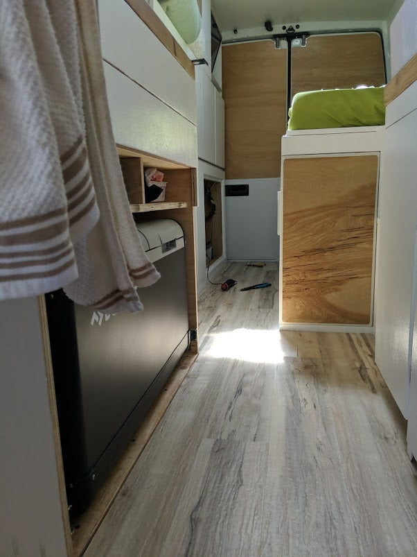  and wood flooring.|A white high-roof Dodge Sprinter van — photo 1