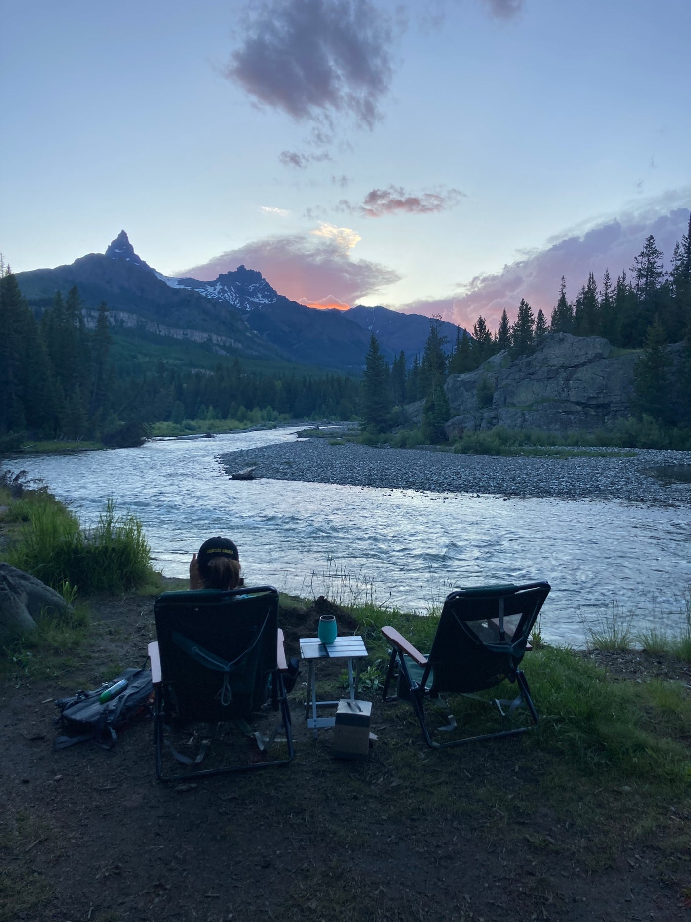 Relaxing riverside with an RV rental view. Two chairs face a scenic mountain and river at sunset, perfect for unwinding. — photo 20