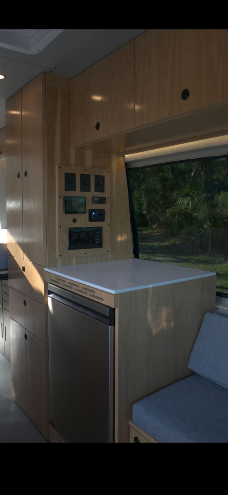  and a dog.|Spacious RV rental interior featuring swiveled front seats — photo 4