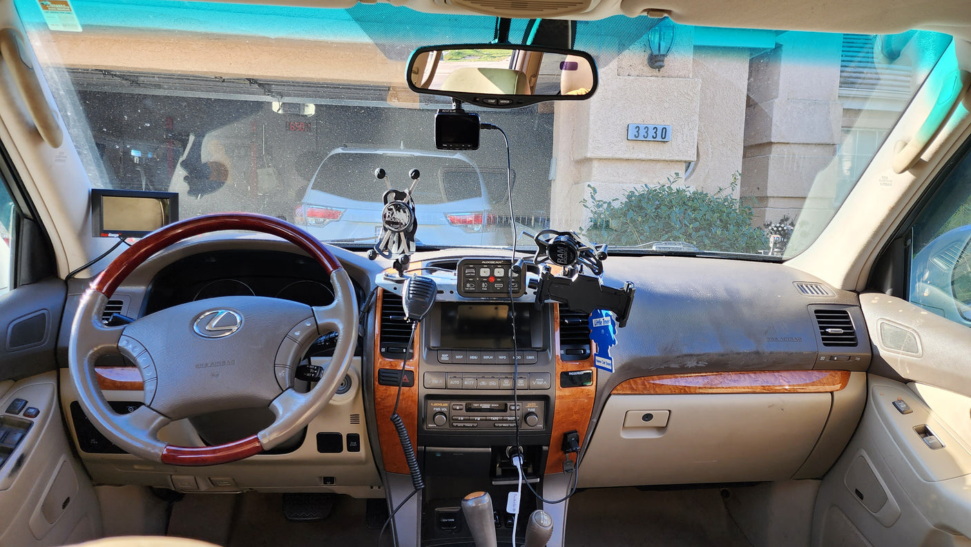 View from car with complex dash setup, great for an RV rental journey or extended travel.