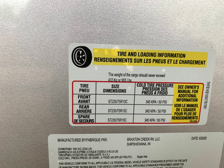 Essential tire and loading information for an RV rental, showing tire pressure (50 PSI), cargo capacity (955 lbs), and tire sizes.