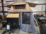 Explore the outdoors with this teardrop trailer & rooftop tent combo, an ideal RV rental for off-grid adventures.