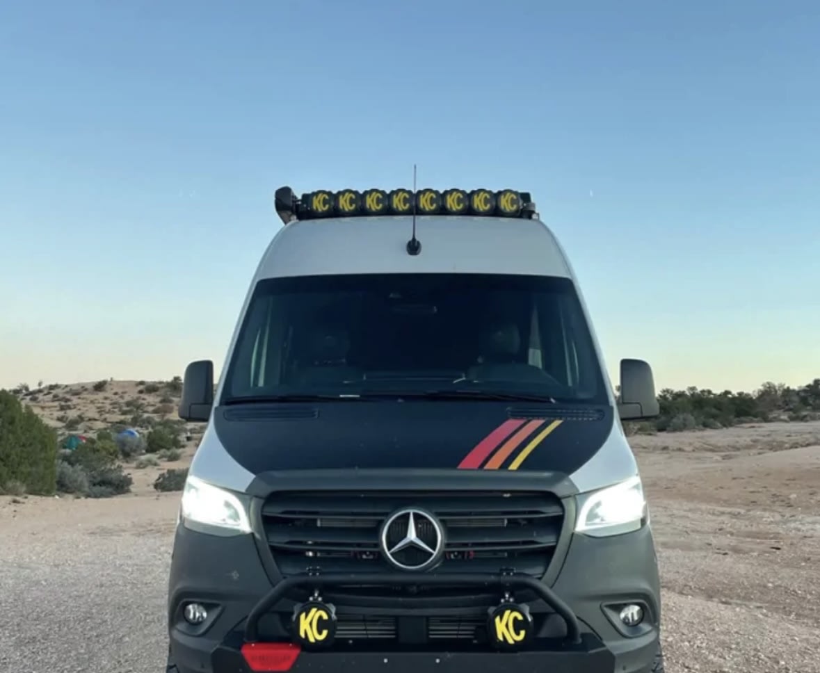  and roof lights in desert.|This lifted Mercedes Sprinter camper van