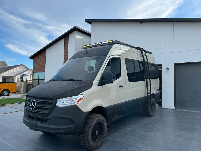 revealing interior. Perfect for an RV rental adventure.|Custom Sprinter van with rear tire mount — photo 8