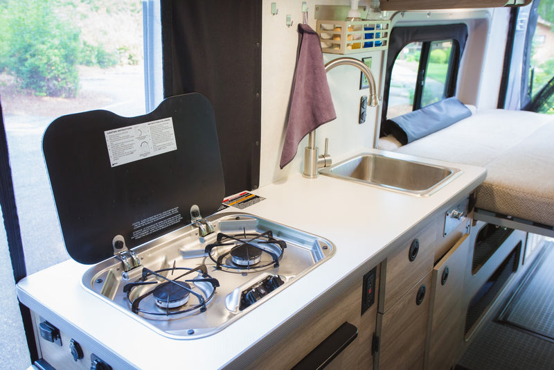  offering forest views. Relax and connect with nature.|RV rental interior: Rear passenger seating — photo 17