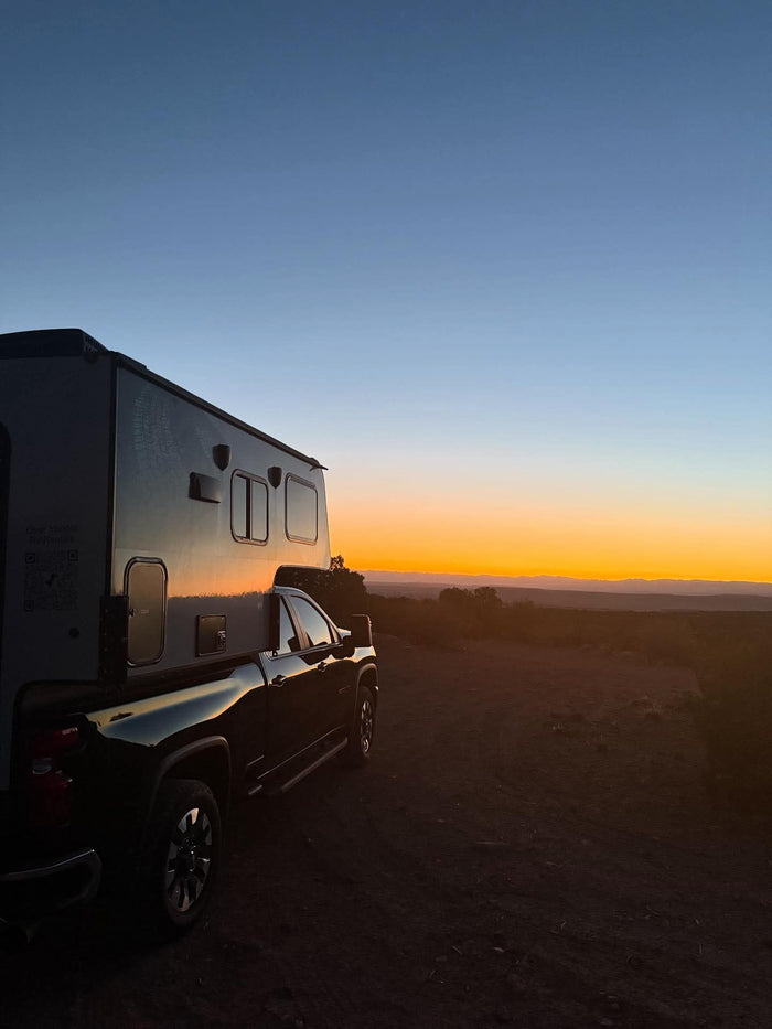  ready for your next adventure.|Cozy RV rental interior: elevated bed