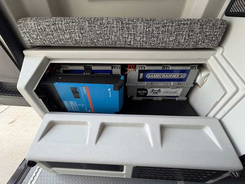 Inside an RV rental: Victron inverter/charger & Battle Born LiFePO4 battery providing reliable power. — photo 9