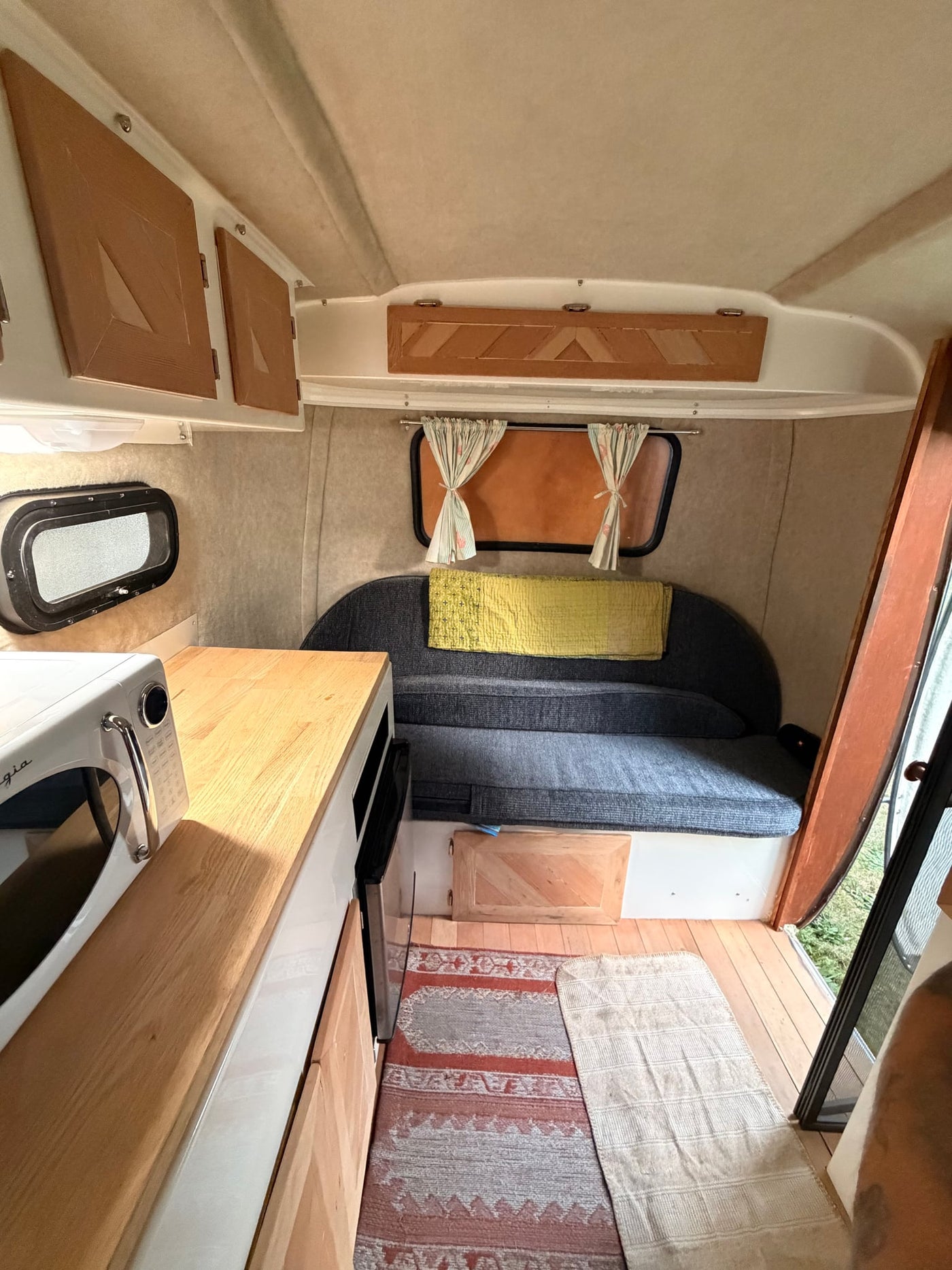 a compact kitchenette features a microwave — photo 10