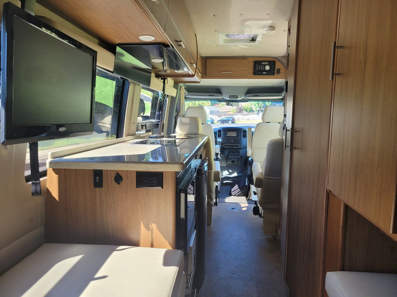  featuring a mounted Jensen TV — photo 14