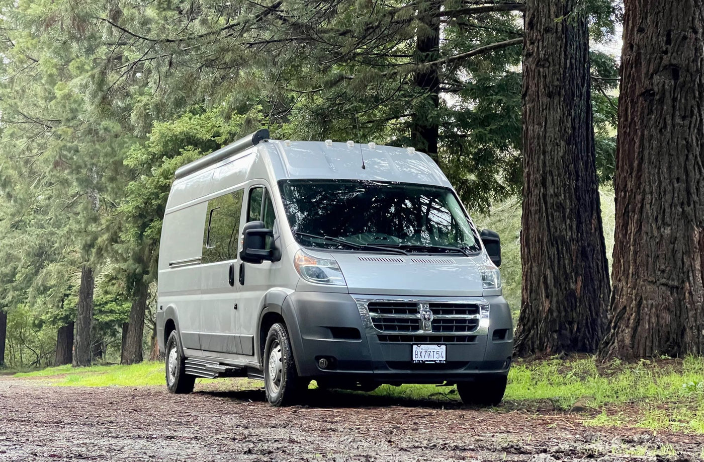  is parked outdoors. Features include a roof AC unit and awning — photo 2