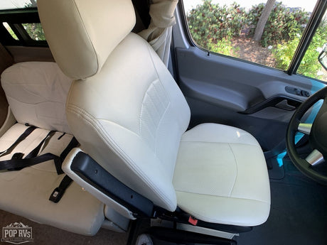 Step inside this comfortable RV rental! Bright, clean leather seats and spacious interior await your next journey.