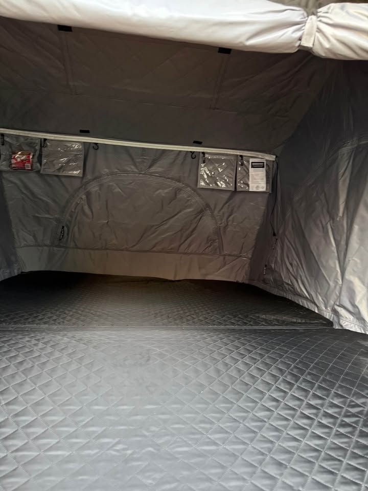 Free Spirit Recreation Rooftop Tent and Awning with RCI Bed rack in Frederick, CO (photo 10) — photo 10