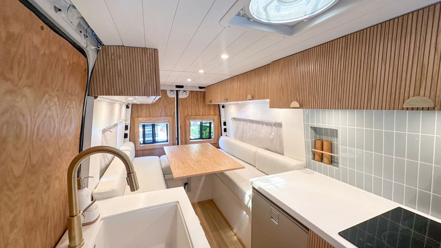  green setting.|White Mercedes-Benz Sprinter van