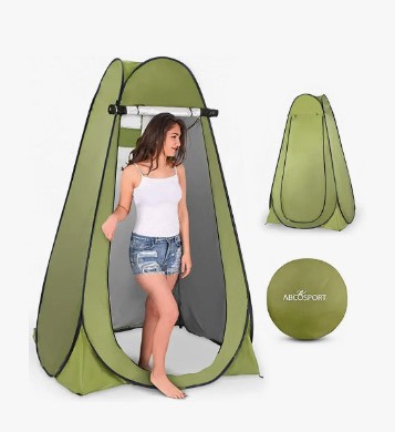  revealing a comfy bed & wooden shelves inside. Perfect for camping — photo 13