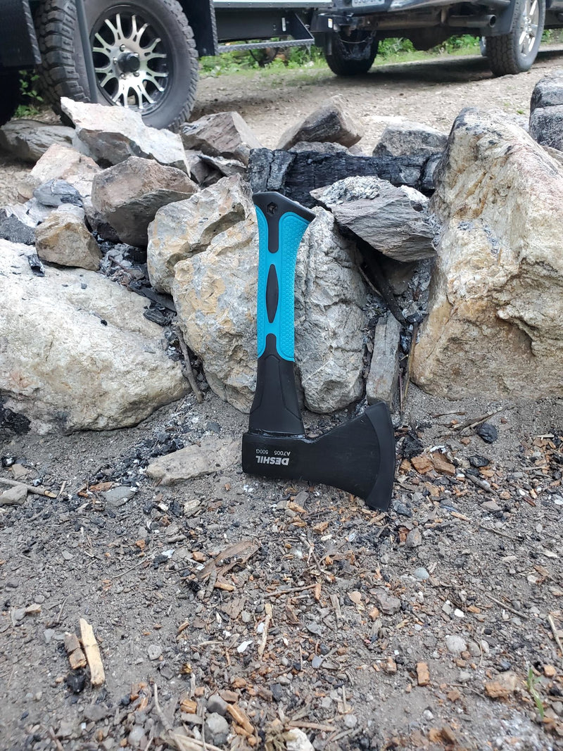  resting on gravel. Essential for a steady camp setup.|An RV rental's practical compact kitchen with a stove — photo 13
