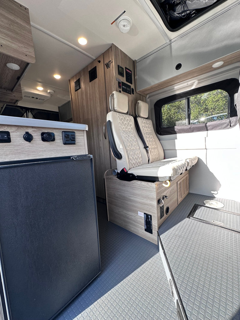  and front cabin view for comfortable travel.|Compact mini-fridge in an RV rental — photo 17