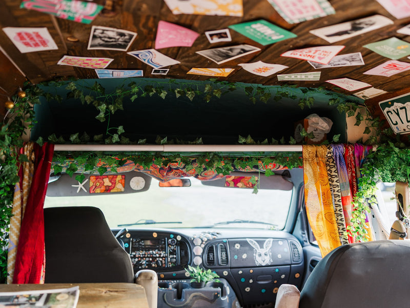  and champagne flutes set a peaceful mood.|Eclectic wood ceiling in an RV rental — photo 15