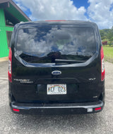 Rear view of a black Ford Transit Connect van, a versatile vehicle for everyday use or as a practical rv rental for travel.