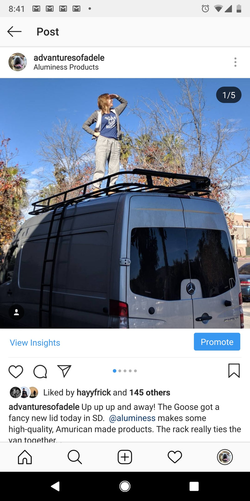 A person stands on a spacious RV rental van with its new roof rack and ladder, ready for adventure! — photo 5