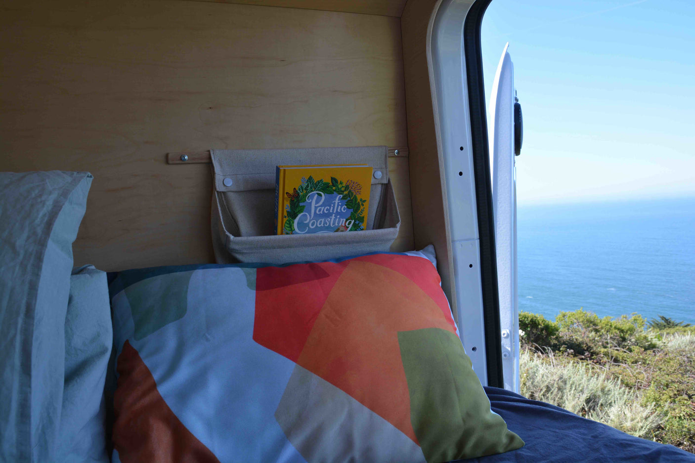 Enjoying a stunning ocean view from a cozy RV rental. Perfect for your next Pacific Coasting adventure!