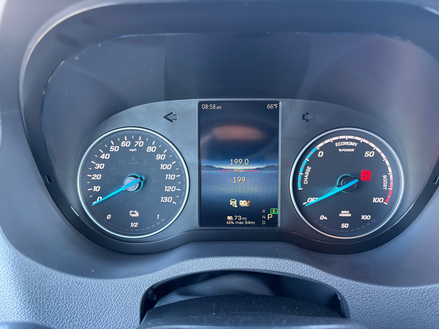 RV rental digital dashboard showing 0 mph, 73 miles electric range, and PARK light on, with 08:58 am and 66°F.