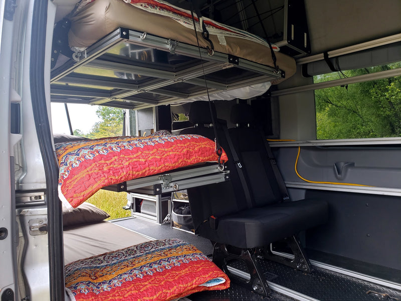  and lush green outside view.|Experience comfort in this RV rental! View of rear seats — photo 9