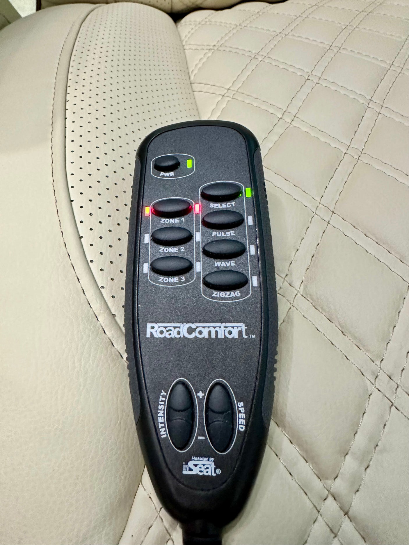 RV rental comfort: RoadComfort massage seat remote with zones, intensity, and speed controls for a relaxing journey.