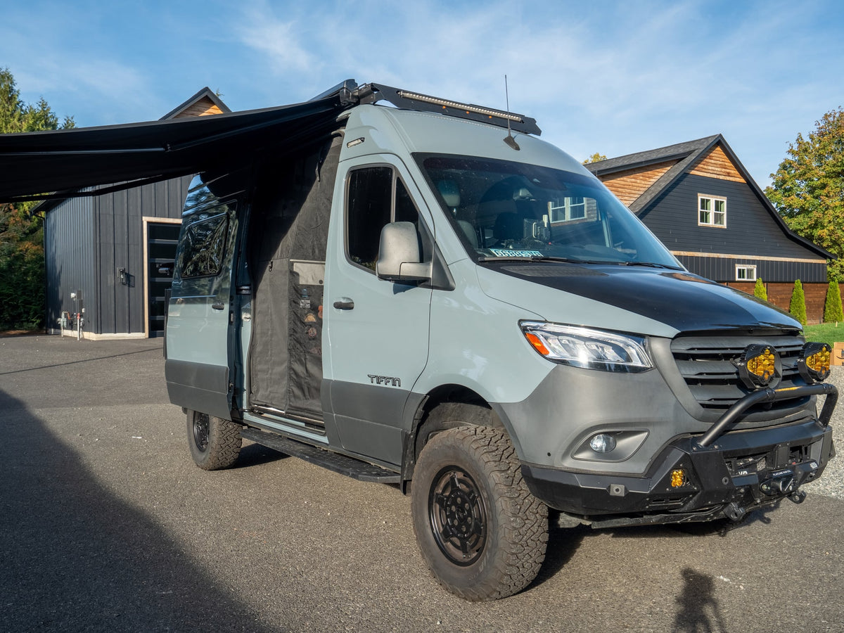  ideal for RV rental adventures.|A robust grey Mercedes Sprinter adventure van — photo 13