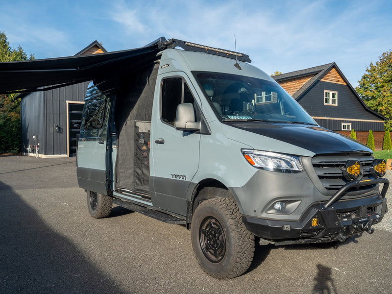  ideal for RV rental adventures.|A robust grey Mercedes Sprinter adventure van — photo 13