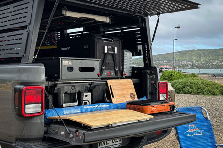 RV rental ready: This truck bed features a Dometic fridge, Eureka grill, and camping kitchen for an outdoor adventure.