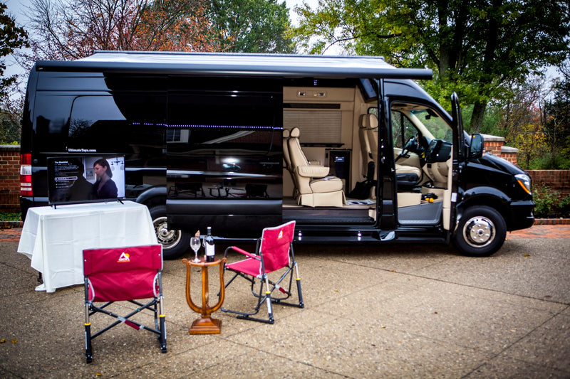  and control panel for comfort.|Luxury RV rental interior features cream quilted seating — photo 5